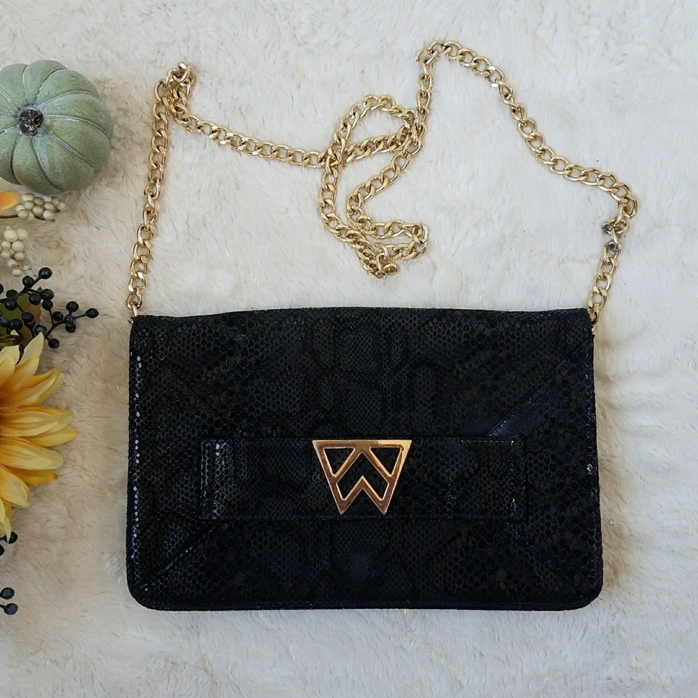 Kelly Wynne Leather Crossbody Leather Snake Clutch